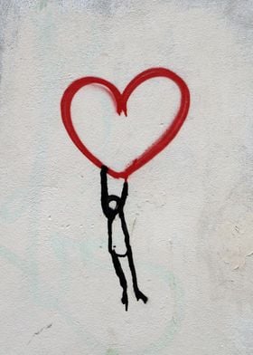 Man holding a red heart