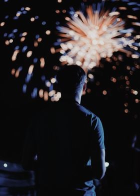 Person watching crackers