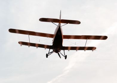 Plane flying in the sunset