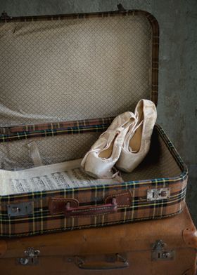 Ballet shoes in suitcase