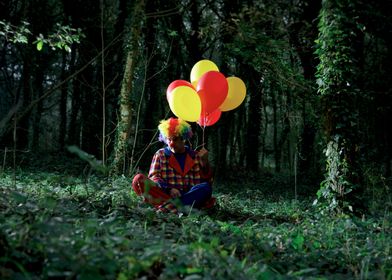 Clown man in the forest