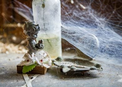 Old figurine with cobweb