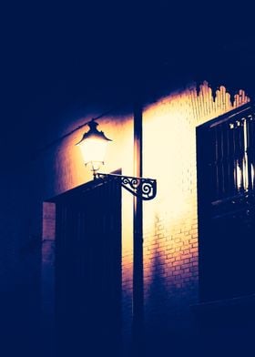 Street lamp on a brick wal