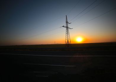 Sunrise with electric pole