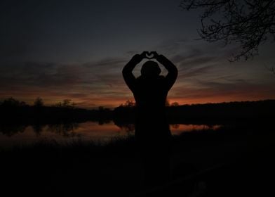 silhouette of woman at sun