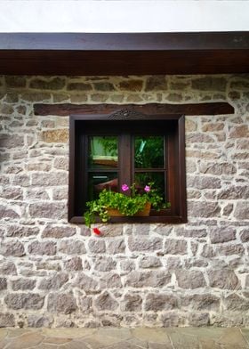 A wooden window on a wall 