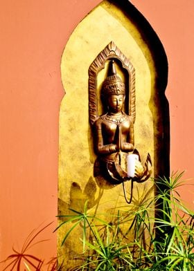 Buddha in wall recess