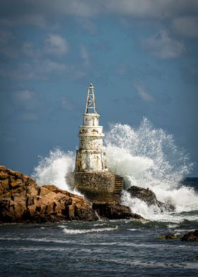 Lighthouse at big waves