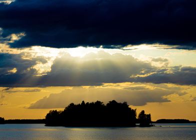 Layered sky above a lake