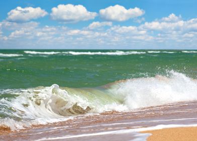 Wave Hitting A Beach In A 