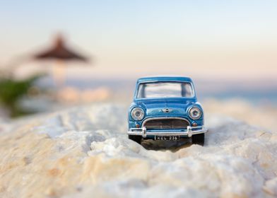 Vintage toy car at beach