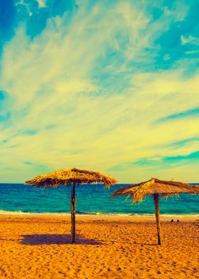 Two Straw Beach Umbrellas 