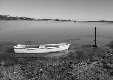 Boat Tied To A Pole