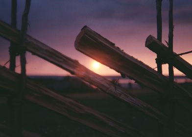 Sunset through a fence