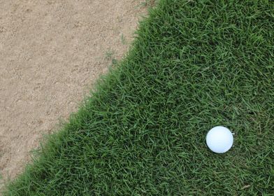 Golf ball near bunker