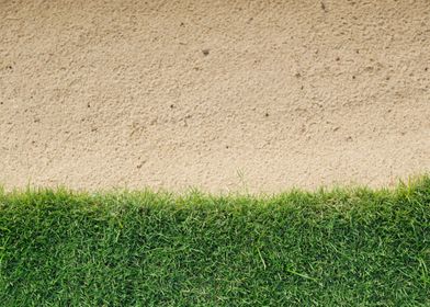 green grass with sand bunk