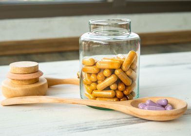 Supplement in glass bottle