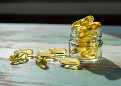 Fish oil capsules in glass