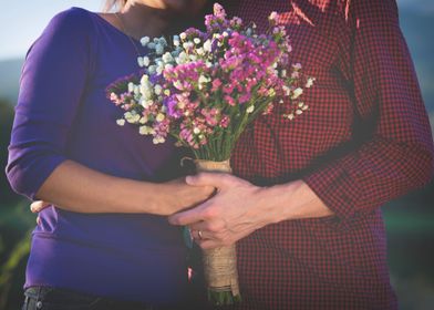 holding Valentines flowers