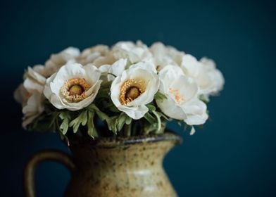 Flower in clay vase