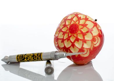 carved red apple