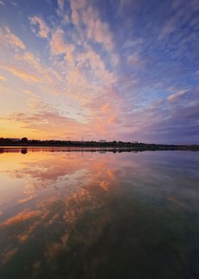 fluffy clouds reflection