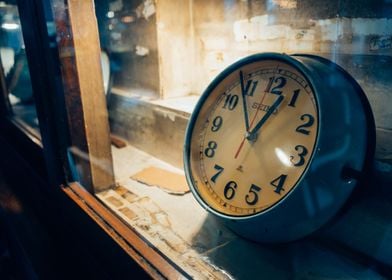 Vintage clock in cabinet