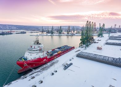 Ship at snowy Varna port