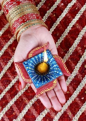 Diwali Oil Lamp in a Hand