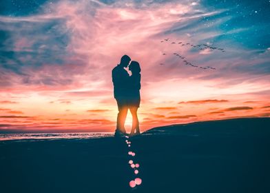 Couple at sunset scenery
