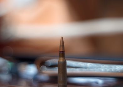 Rifle ammo on blurred