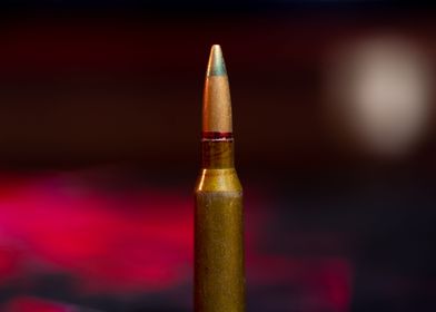 Rifle ammo on blurred