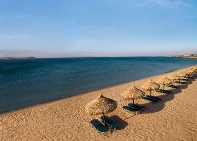 beach side straw umbrellas