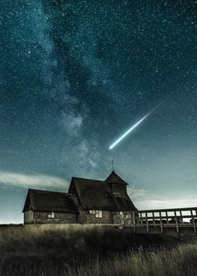 Shooting star in night sky