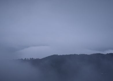 Mountain in fog panorama