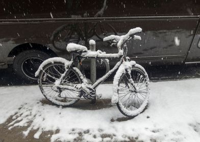 Urban bike covered snow