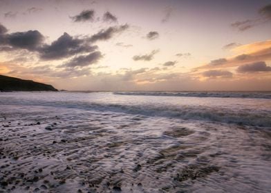 Sunrise at Langland Bay