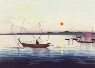 Fishing boats at sunset 