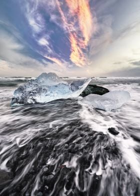 Ice beach waves and clouds