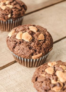 Three chocolate muffins li