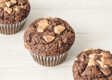 Three chocolate muffins li