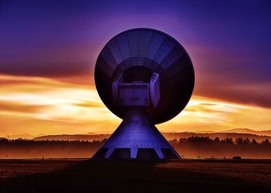 Radio telescope and sunset