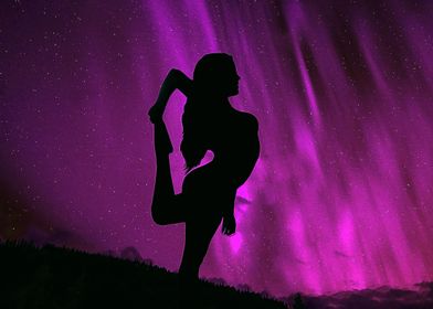 Woman yoga aurora borealis