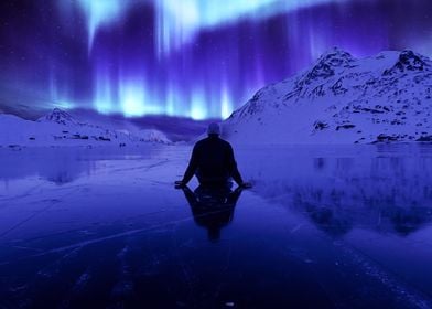 Man and aurora borealis