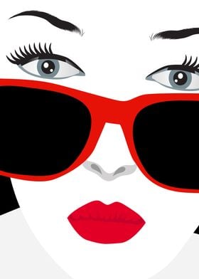 A woman in red glasses