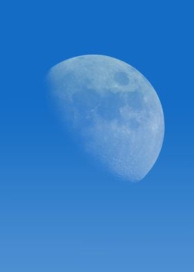 Moon on the clear blue sky