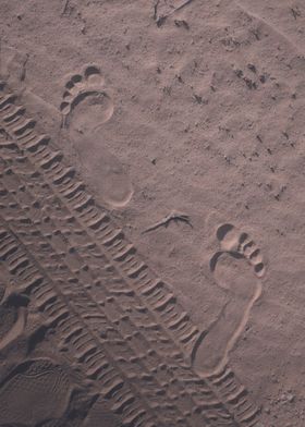 Footprints in grey Sand 