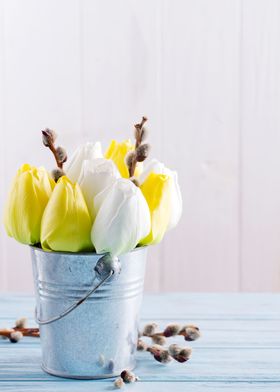 tulips flowers in a bucket