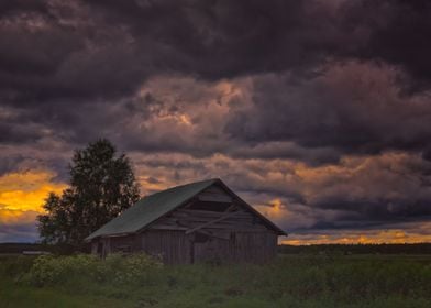 Barn Under Storm Clouds