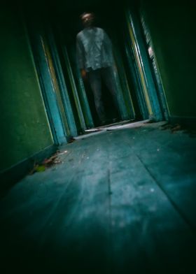 Blurred man in a hallway